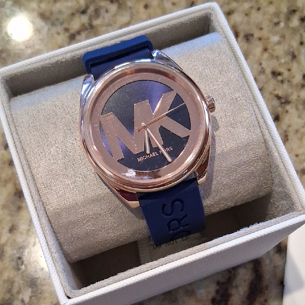 Michael Kors Blue and Gold Watch with Distinctive Design